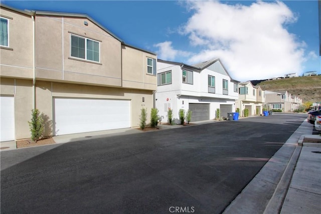 view of property featuring a garage