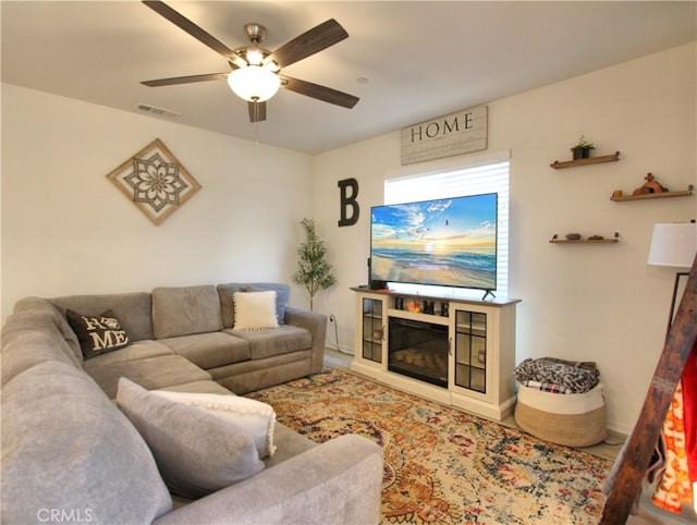 living room with ceiling fan