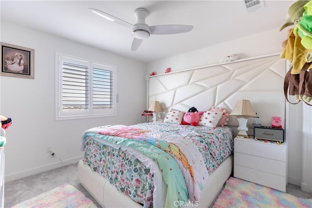 bedroom featuring ceiling fan and light colored carpet