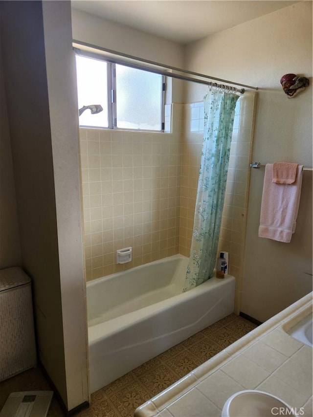 full bathroom with shower / bathtub combination with curtain and tile patterned floors