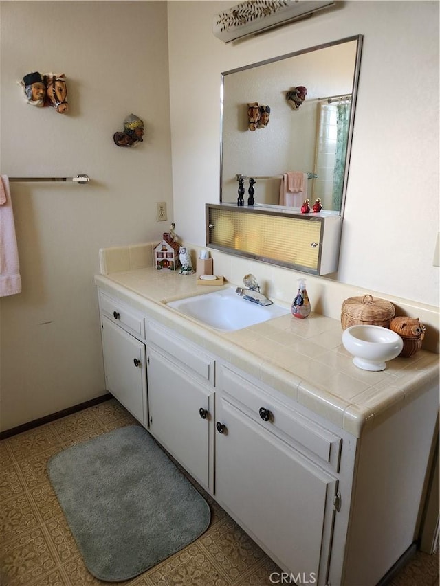 bathroom featuring vanity and tile patterned floors