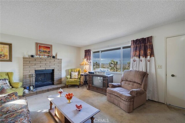 living room featuring a textured ceiling, a brick fireplace, and light colored carpet