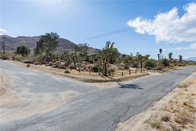 view of street featuring a rural view and a mountain view