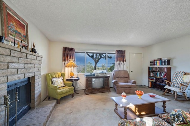 living room featuring a textured ceiling, a fireplace, and light carpet