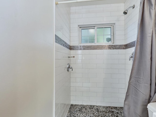 bathroom featuring walk in shower