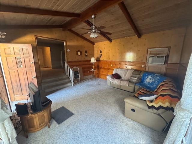 carpeted living room featuring wood walls, lofted ceiling with beams, cooling unit, ceiling fan, and wood ceiling