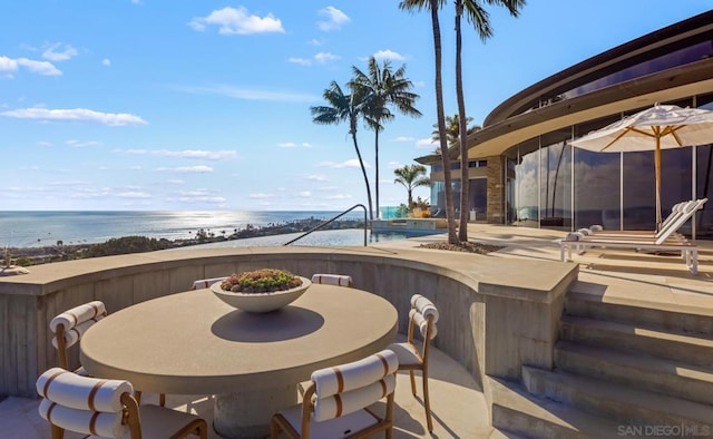 view of patio / terrace featuring a water view