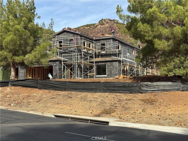 exterior space featuring a mountain view