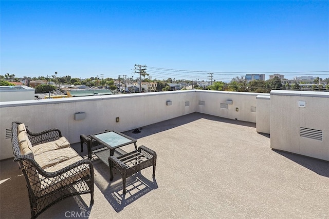 view of patio / terrace with a balcony