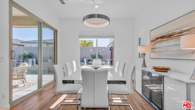 dining room with light wood-type flooring