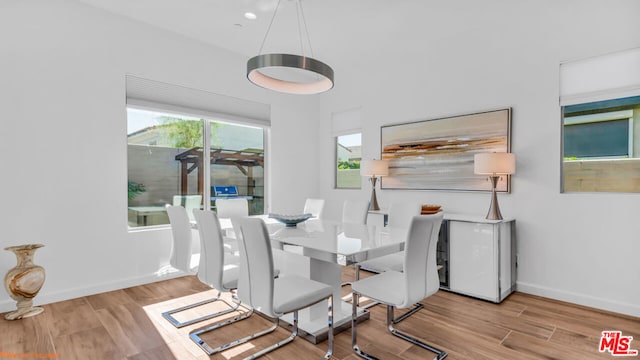 dining area with light wood-type flooring