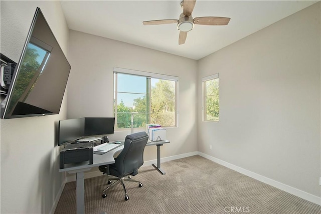 carpeted office with ceiling fan