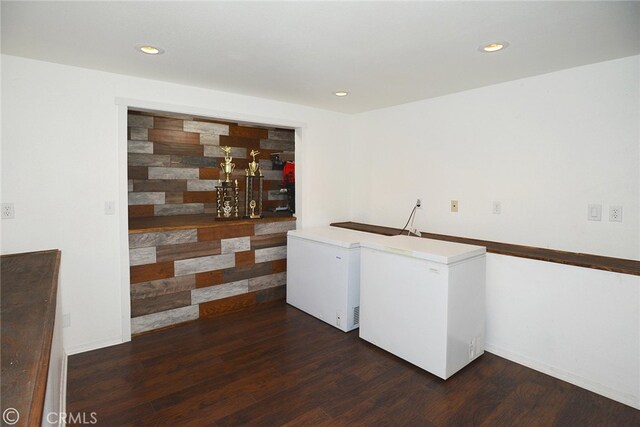 washroom with dark hardwood / wood-style floors