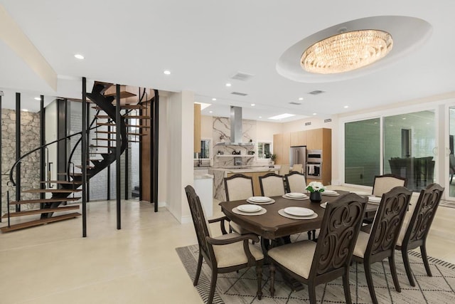 dining room featuring a notable chandelier