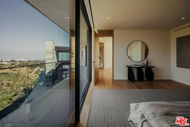 bedroom featuring hardwood / wood-style floors