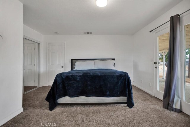 10590 Navajo Rd, Apple Valley, CA 92308 - carpeted bedroom with baseboards and access to exterior