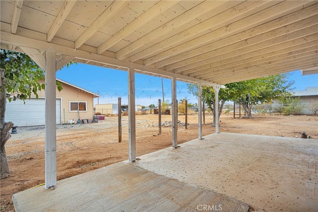 view of patio / terrace featuring fence