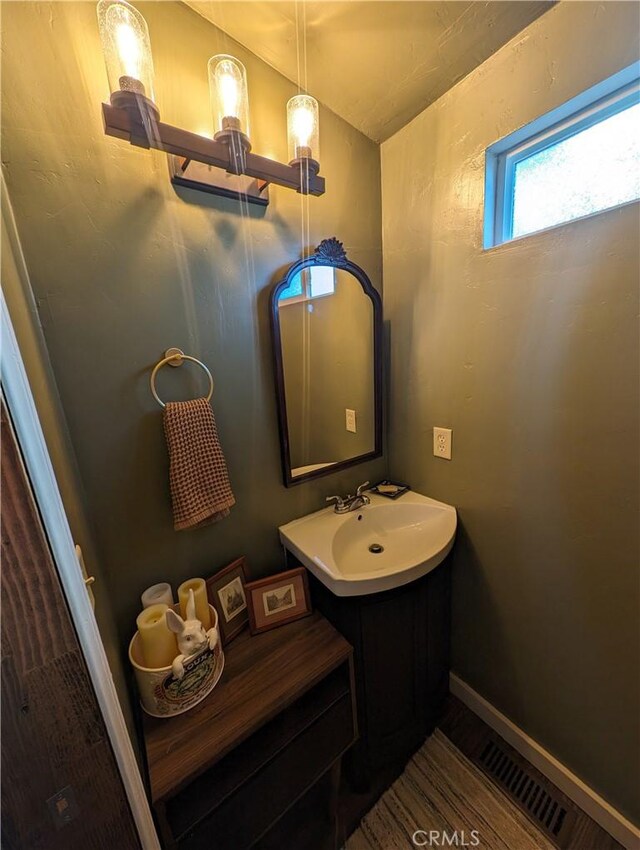2552 Catalina Dr, Running Springs, CA 92382 - bathroom featuring vanity and lofted ceiling
