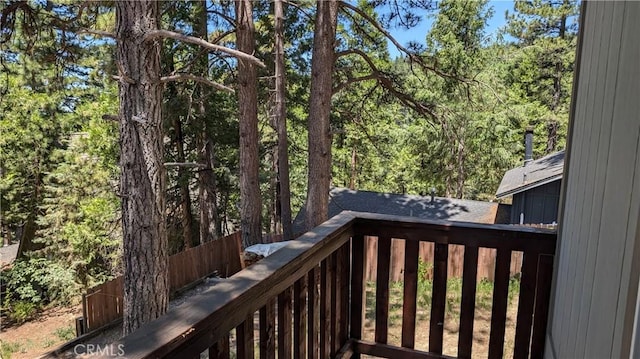 2552 Catalina Dr, Running Springs, CA 92382 - wooden terrace featuring a forest view and fence