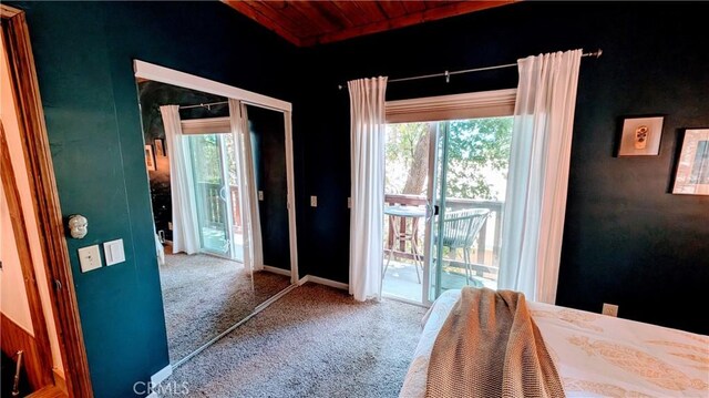 2552 Catalina Dr, Running Springs, CA 92382 - carpeted bedroom with access to exterior, multiple windows, baseboards, and wood ceiling