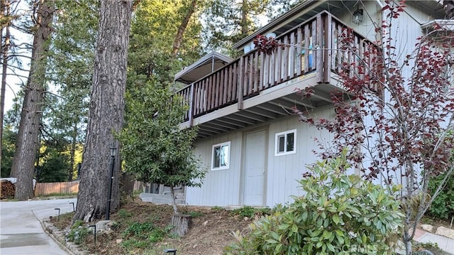 view of home's exterior featuring a balcony