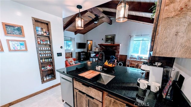 2552 Catalina Dr, Running Springs, CA 92382 - kitchen with a sink, a ceiling fan, dark stone counters, pendant lighting, and vaulted ceiling with beams