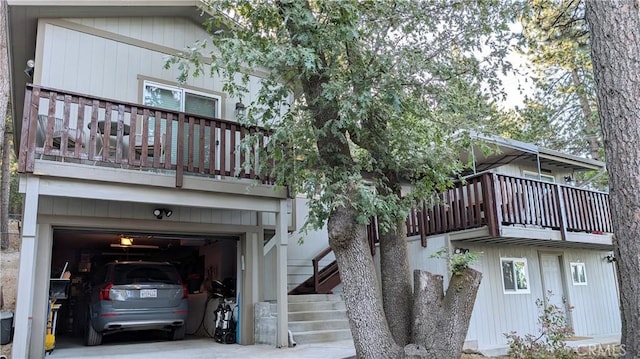 2552 Catalina Dr, Running Springs, CA 92382 - rear view of property with an attached garage and driveway