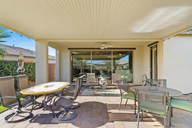 view of patio / terrace featuring ceiling fan