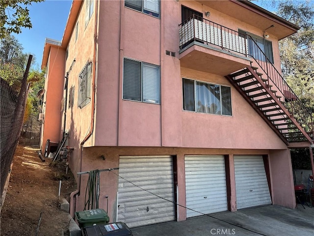 view of building exterior with a garage