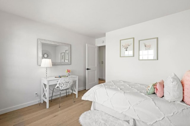 bedroom featuring light hardwood / wood-style flooring