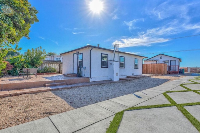 view of front of property featuring a patio