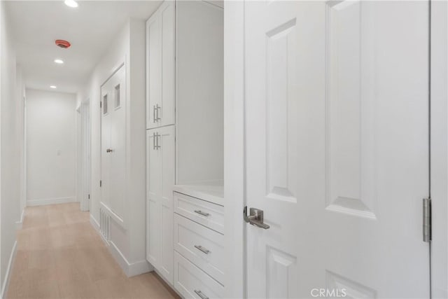 hall featuring light wood-type flooring