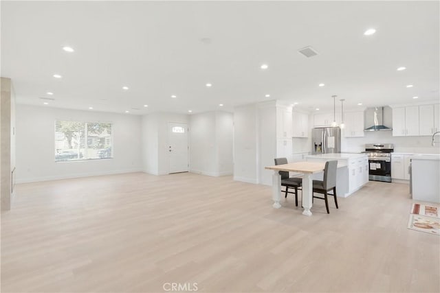 living room with light hardwood / wood-style floors