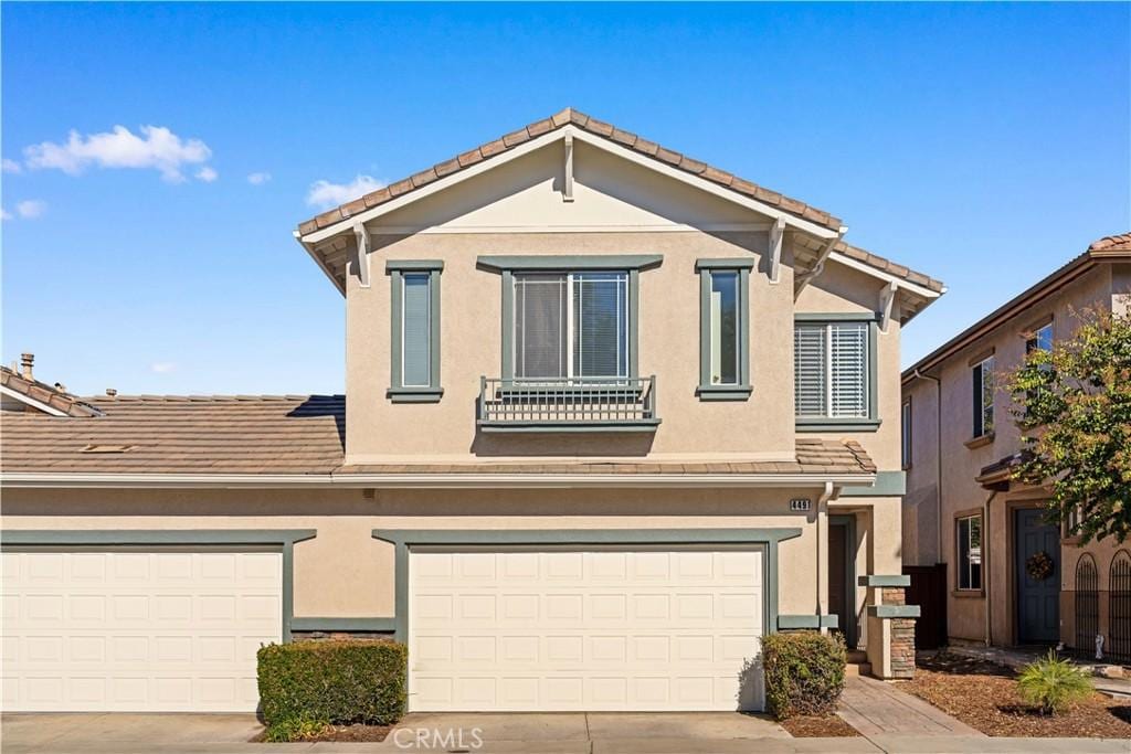 view of front of home with a garage