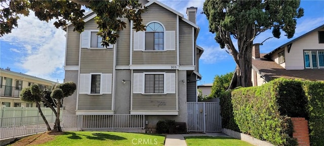 905 S 2nd St Unit D, Alhambra, CA 91801 - view of front facade with a gate and a chimney