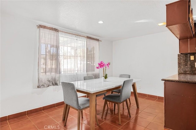 dining room with tile patterned floors