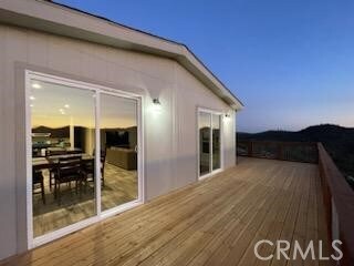 view of deck at dusk