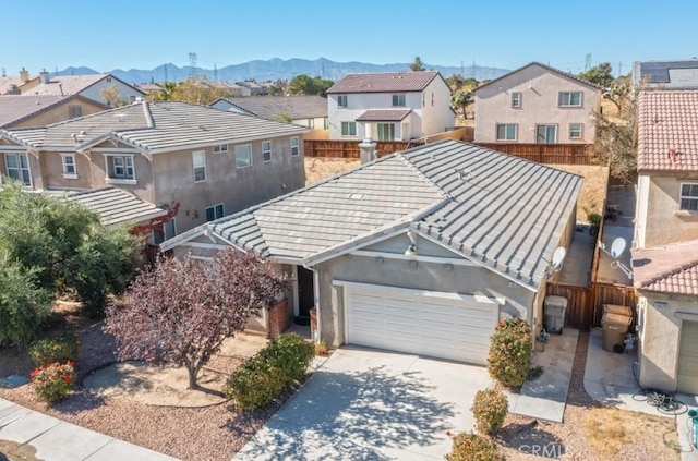 birds eye view of property featuring a mountain view