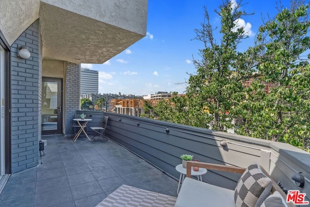 view of patio / terrace featuring a balcony