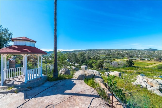 view of patio with a mountain view