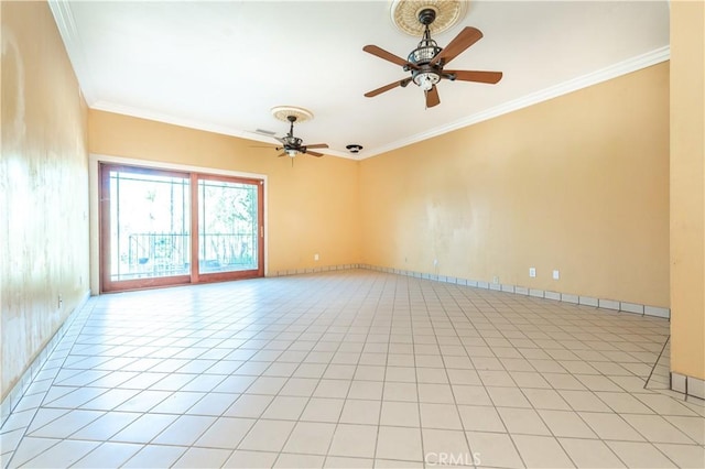 tiled spare room with ceiling fan and ornamental molding