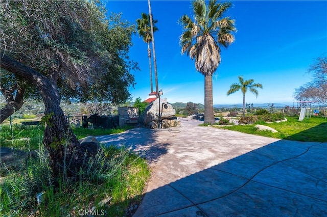 view of patio with a mountain view