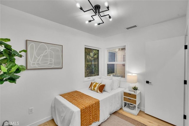 bedroom featuring hardwood / wood-style floors