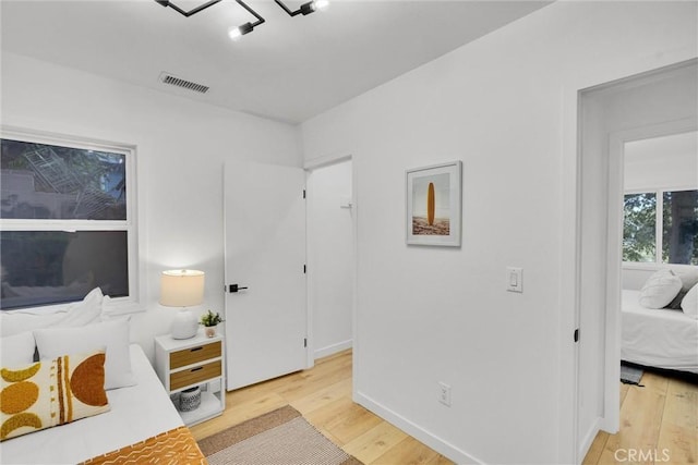 bedroom featuring light wood-type flooring