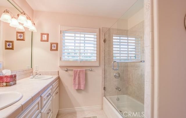 2034 Virazon Dr, La Habra Heights, CA 90631 - bathroom featuring tile patterned flooring, vanity, and combined bath / shower with glass door