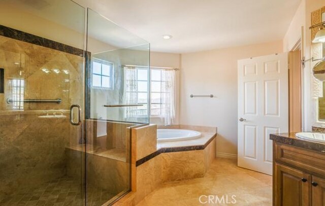 2034 Virazon Dr, La Habra Heights, CA 90631 - full bathroom with vanity, a bath, a shower stall, and tile patterned floors