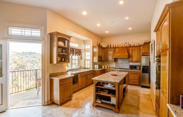 2034 Virazon Dr, La Habra Heights, CA 90631 - kitchen featuring premium range hood, decorative backsplash, light stone countertops, appliances with stainless steel finishes, and a kitchen island