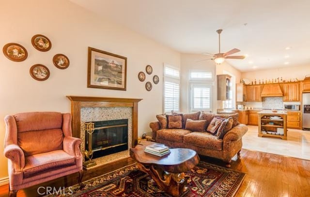 2034 Virazon Dr, La Habra Heights, CA 90631 - living room featuring a fireplace, light hardwood / wood-style floors, and ceiling fan