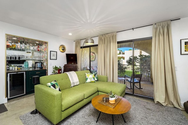 living room with wine cooler and bar area