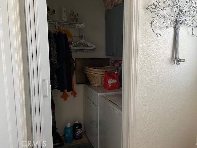 laundry area with washer and dryer